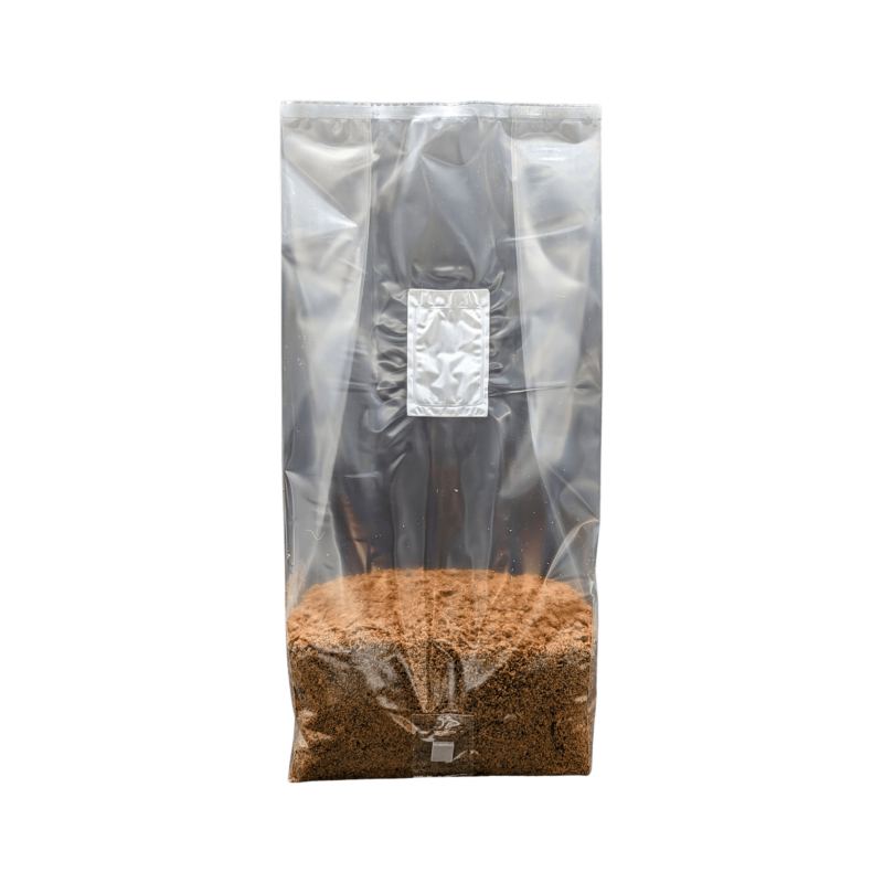 Tall standing bag of 5 pounds Spawn Magic Master's Mix, clear view of brown wood-based substrate at the bottom, isolated on a transparent background.