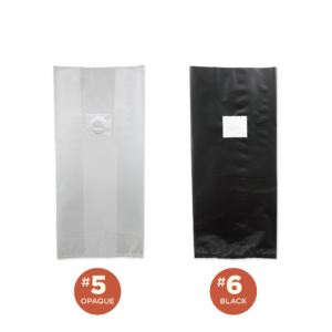 Sakato #5 opaque and #6 black polyethylene mushroom grow bags side by side, empty