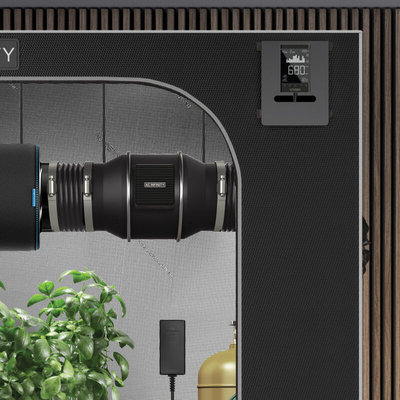 AC Infinity CO2 Controller mounted in a grow tent showing real-time carbon dioxide management for plant growth